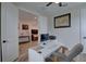 Bright home office with a white desk and view of the living room at 2860 14Th N Ave, St Petersburg, FL 33713