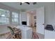 Home office with built-in desk and view into entryway at 2860 14Th N Ave, St Petersburg, FL 33713