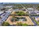 Aerial view of condo complex with pool and surrounding parking lot at 4315 Aegean Dr # 126C, Tampa, FL 33611
