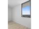 Bright bedroom with window offering a distant view at 2912 W Santiago St # Ph2402, Tampa, FL 33629