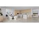 Elegant dining room with modern light wood cabinets and island at 2912 W Santiago St # Ph2402, Tampa, FL 33629