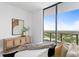 Bedroom with city view and stylish decor at 2912 W Santiago St # Ph2402, Tampa, FL 33629