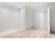 Simple bedroom with light flooring and access to another room at 2912 W Santiago St # Ph2402, Tampa, FL 33629