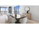 Elegant dining room with water view and modern furnishings at 2912 W Santiago St # Ph2402, Tampa, FL 33629