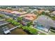 Aerial view of waterfront homes with private docks and pools at 1233 Acappella Ln, Apollo Beach, FL 33572