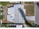 Aerial view of the home's roof, highlighting its structure and surrounding yard at 2061 64Th S Ave, St Petersburg, FL 33712