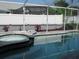 Refreshing pool and spa area with screened enclosure at 11727 Spanish Lake Dr, Tampa, FL 33635