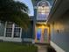 Front entrance of a two-story house with a double door at 11727 Spanish Lake Dr, Tampa, FL 33635