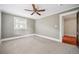 Bright bedroom with ceiling fan and neutral carpeting at 455 13Th Ne Ave, St Petersburg, FL 33701