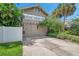 House exterior with driveway and two-car garage at 455 13Th Ne Ave, St Petersburg, FL 33701