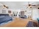 Spacious bedroom with hardwood floors and ceiling fan at 455 13Th Ne Ave, St Petersburg, FL 33701