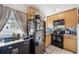 Cozy kitchen with wood cabinets and modern appliances at 455 13Th Ne Ave, St Petersburg, FL 33701