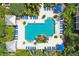 Aerial view of resort-style pool with multiple lounge chairs at 4207 S Dale Mabry Hwy # 11109, Tampa, FL 33611