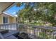 Private balcony overlooks lush green space and neighboring buildings at 3730 42Nd S Way # G, St Petersburg, FL 33711