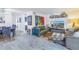 Spacious living room with comfortable seating and large artwork at 3730 42Nd S Way # G, St Petersburg, FL 33711