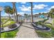 Resort-style pool with lush landscaping and a gazebo at 3730 42Nd S Way # G, St Petersburg, FL 33711