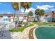 Community backyard with putting green and landscaping at 3730 42Nd S Way # G, St Petersburg, FL 33711
