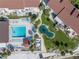 Complex pool and surrounding lounge area, top-down view at 3730 42Nd S Way # G, St Petersburg, FL 33711