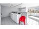 Clean laundry room with multiple washers and dryers at 3730 42Nd S Way # G, St Petersburg, FL 33711
