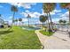 Inviting pool area with a putting green and waterfront views at 3730 42Nd S Way # G, St Petersburg, FL 33711