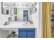 Clean bathroom with updated vanity, shower, and stylish decor at 3730 42Nd S Way # G, St Petersburg, FL 33711
