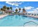 Sparkling community pool, steps and ample lounge chairs at 3730 42Nd S Way # G, St Petersburg, FL 33711