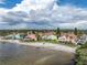 Aerial view of waterfront community, showcasing beach and buildings at 3730 42Nd S Way # G, St Petersburg, FL 33711