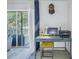 Functional home office space with a desk, computer, and printer at 3730 42Nd S Way # G, St Petersburg, FL 33711