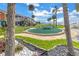 Landscaped putting green area with a waterfront view at 3730 42Nd S Way # G, St Petersburg, FL 33711