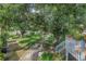 Pathway meanders through a lush, tree-filled landscape at 3730 42Nd S Way # G, St Petersburg, FL 33711