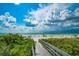 Boardwalk path to beach with ocean view at 724 Gulf Blvd # A & B, Indian Rocks Beach, FL 33785