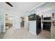 Clean and modern kitchen with black appliances and white cabinets at 724 Gulf Blvd # A & B, Indian Rocks Beach, FL 33785