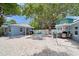 Shared backyard with multiple seating areas at 724 Gulf Blvd # A & B, Indian Rocks Beach, FL 33785