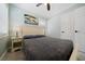 Cozy bedroom with a queen bed and neutral decor at 724 Gulf Blvd # A & B, Indian Rocks Beach, FL 33785