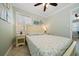 Cozy bedroom with a full-size bed and beach-themed decor at 724 Gulf Blvd # A & B, Indian Rocks Beach, FL 33785
