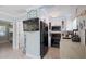 Modern kitchen with stainless steel appliances and white cabinetry at 724 Gulf Blvd # A & B, Indian Rocks Beach, FL 33785