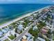 Aerial view of beach homes and a road along the coastline at 724 Gulf Blvd # A & B, Indian Rocks Beach, FL 33785