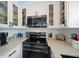 Modern kitchen with stainless steel appliances and white cabinets at 724 Gulf Blvd # A & B, Indian Rocks Beach, FL 33785
