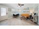 Beach-themed living room with yellow couch and dining area at 724 Gulf Blvd # A & B, Indian Rocks Beach, FL 33785