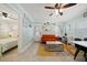 Open living room with view of bedroom and dining area at 724 Gulf Blvd # A & B, Indian Rocks Beach, FL 33785