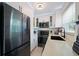 Modern kitchen with stainless steel appliances and white shaker cabinets at 724 Gulf Blvd # A & B, Indian Rocks Beach, FL 33785