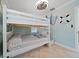 Bedroom with a bunk bed, coastal decor at 724 Gulf Blvd # A & B, Indian Rocks Beach, FL 33785