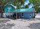 Quaint patio with seating area and outdoor dining space at 724 Gulf Blvd # A & B, Indian Rocks Beach, FL 33785