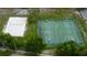 Community park includes basketball, tennis, and sand volleyball courts at 11426 Glenmont Dr, Tampa, FL 33635