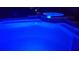 Inviting in-ground pool and spa with underwater lighting, perfect for evening swims at 11426 Glenmont Dr, Tampa, FL 33635