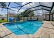 Inviting pool and spa with comfortable seating, creating a perfect outdoor retreat for relaxation and leisure at 11426 Glenmont Dr, Tampa, FL 33635