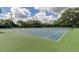 Tennis courts with lighting at 11426 Glenmont Dr, Tampa, FL 33635