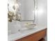 Stylish bathroom with a unique vessel sink, decorative mirror, and modern lighting for a spa-like experience at 4536 W Swann Ave, Tampa, FL 33629