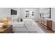 Bright bedroom with stylish furnishings, hardwood floors, and a large window, creating a comfortable retreat at 4536 W Swann Ave, Tampa, FL 33629