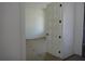 View into a bright bedroom with white trim and a modern door at 4536 W Swann Ave, Tampa, FL 33629